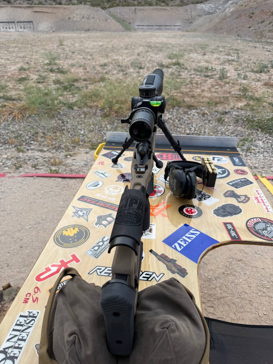 Shooter's-eye view of the custom bench — configured for a steady position and an organized range setup