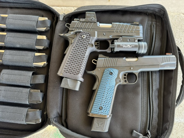1911 duo — custom grips and weapon light, range bag layout