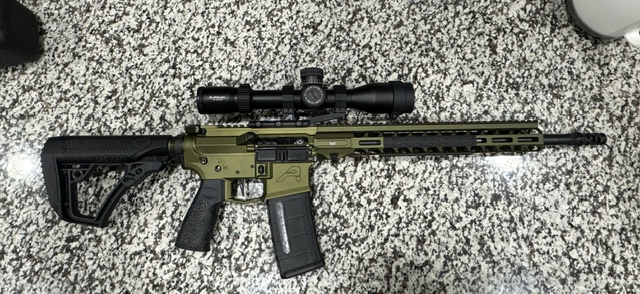 Custom AR-15 — Noveske green cerakote with scope and M-LOK rail