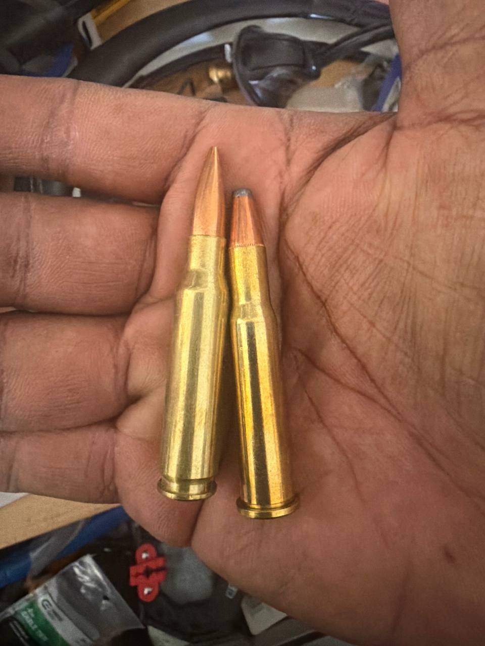 308 Win vs 30-30 Win — cartridge comparison in hand
