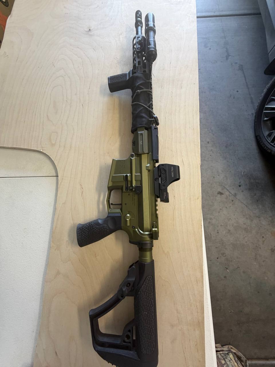 OD green PDW — suppressor-wrapped, folding stock, Kel-Tec holster
