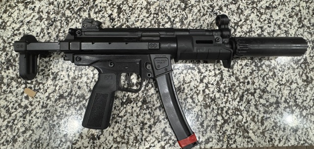 Roller-delayed PDW — suppressed pistol caliber build