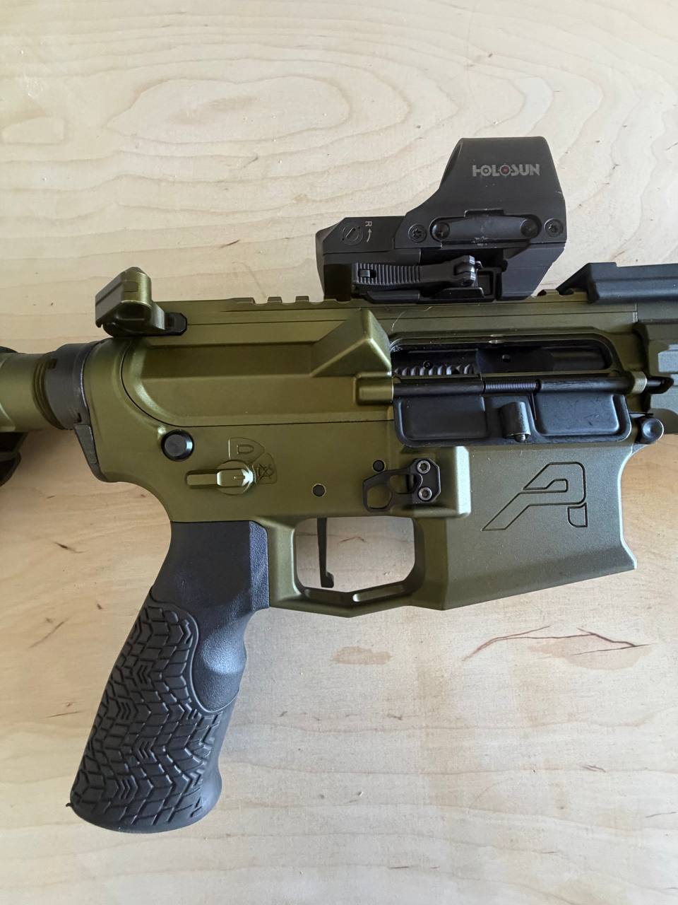 Aero Precision OD green build — Holosun optic, flip-up sights, ambi controls