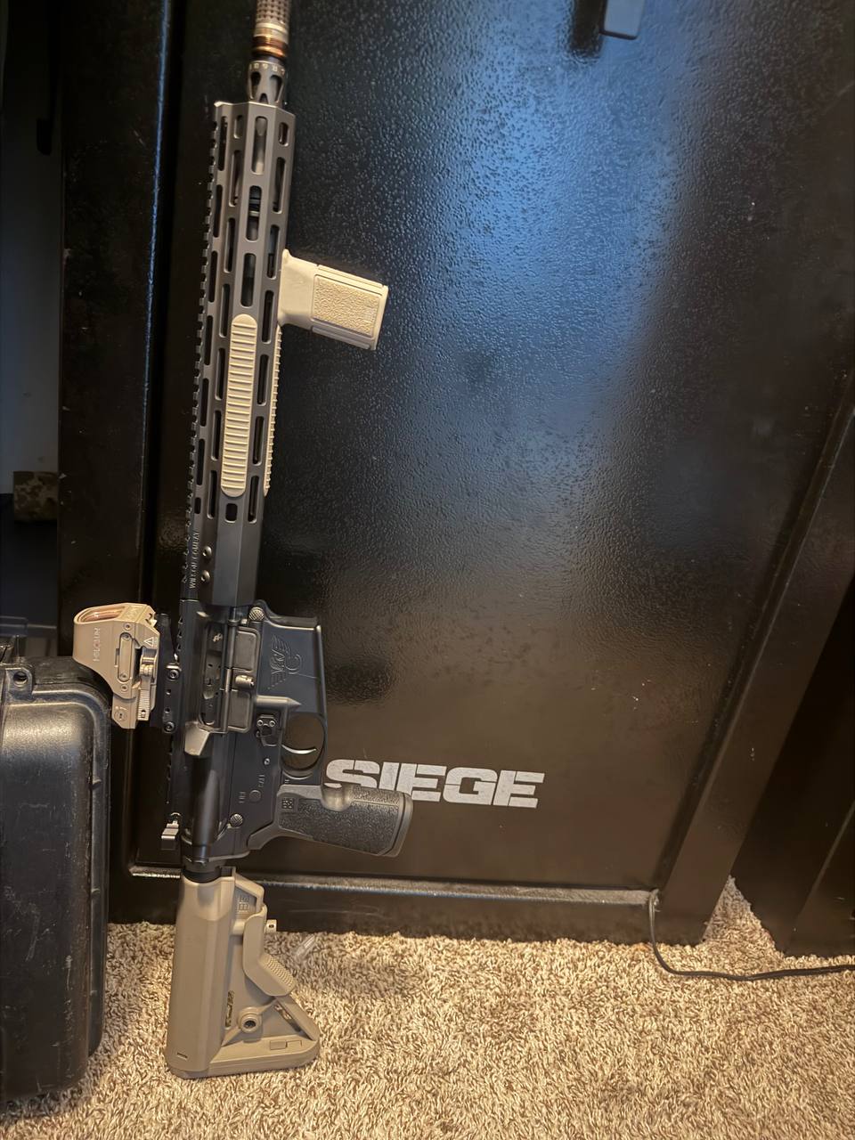 Wilson Combat AR — FDE furniture, MLOK handguard, staged at the Siege safe
